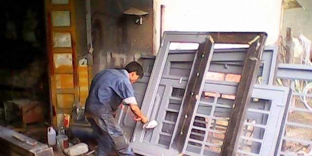 sửa cửa sắt TPHCM