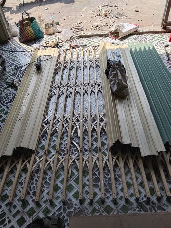 dịch vụ sửa cửa xếp TPHCM