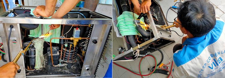 thợ sửa máy làm đá viên tại xưởng